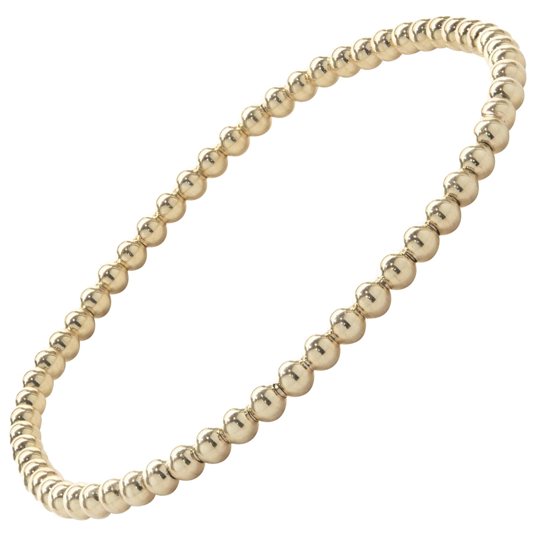 Pulsera flexible de cuentas de oro amarillo de 14 quilates