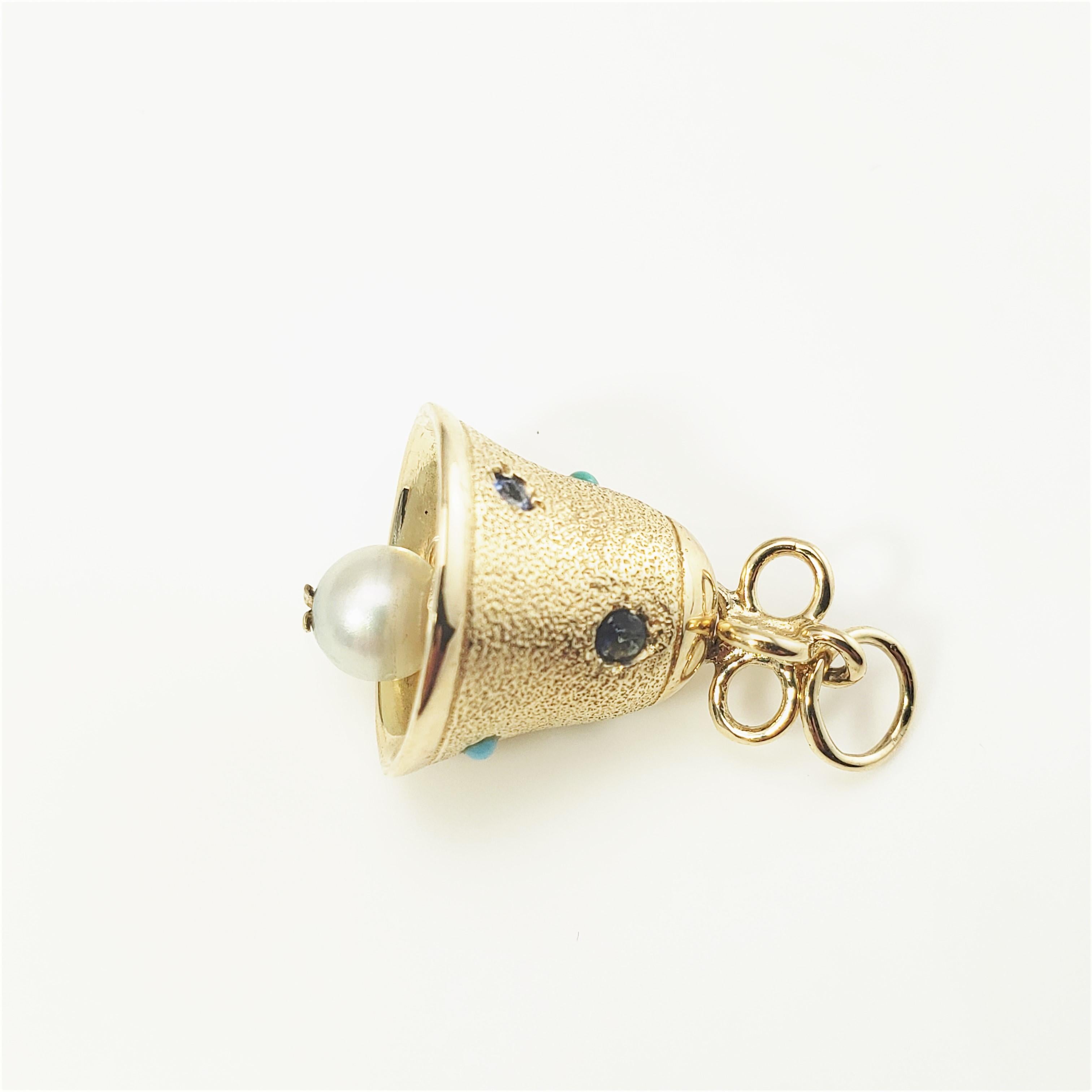 14 Karat Yellow Gold Bell Charm-

This lovely 3D charm features a miniature bell accented with three sapphires, two turquoise stones, and one pearl (6 mm) crafted in beautifully detailed 14K yellow gold.

Size:  18 mm x 15 mm (actual charm)

Weight: