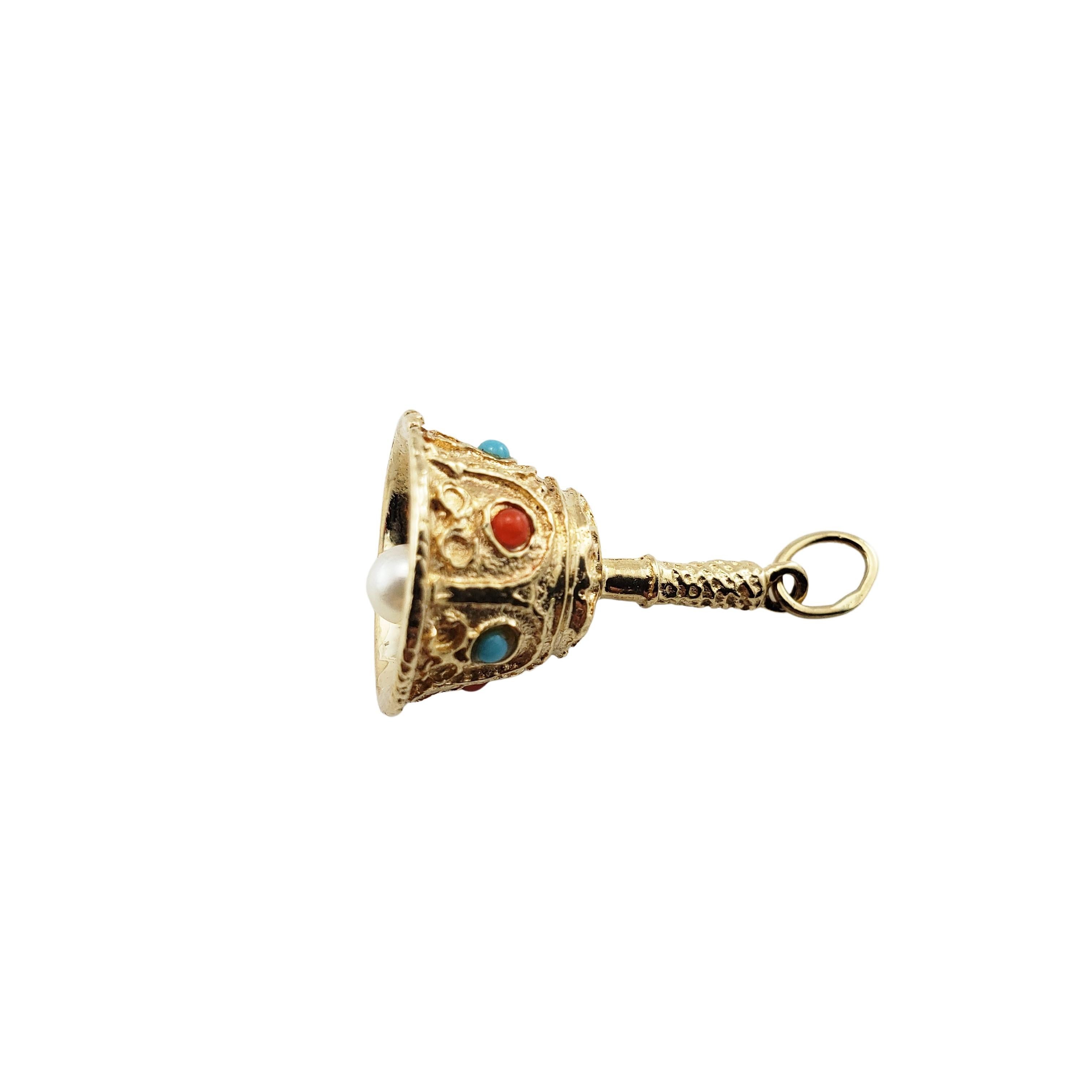 14 Karat Yellow Gold Bell Charm-

This lovely charm features three turquoise stones, three coral stones and one round pearl (3 mm) set in beautifully detailed 14K yellow gold.

Size:  22 x 14 mm

Weight:   2.7 dwt. /  4.3 gr.

Stamped: 14K

Very
