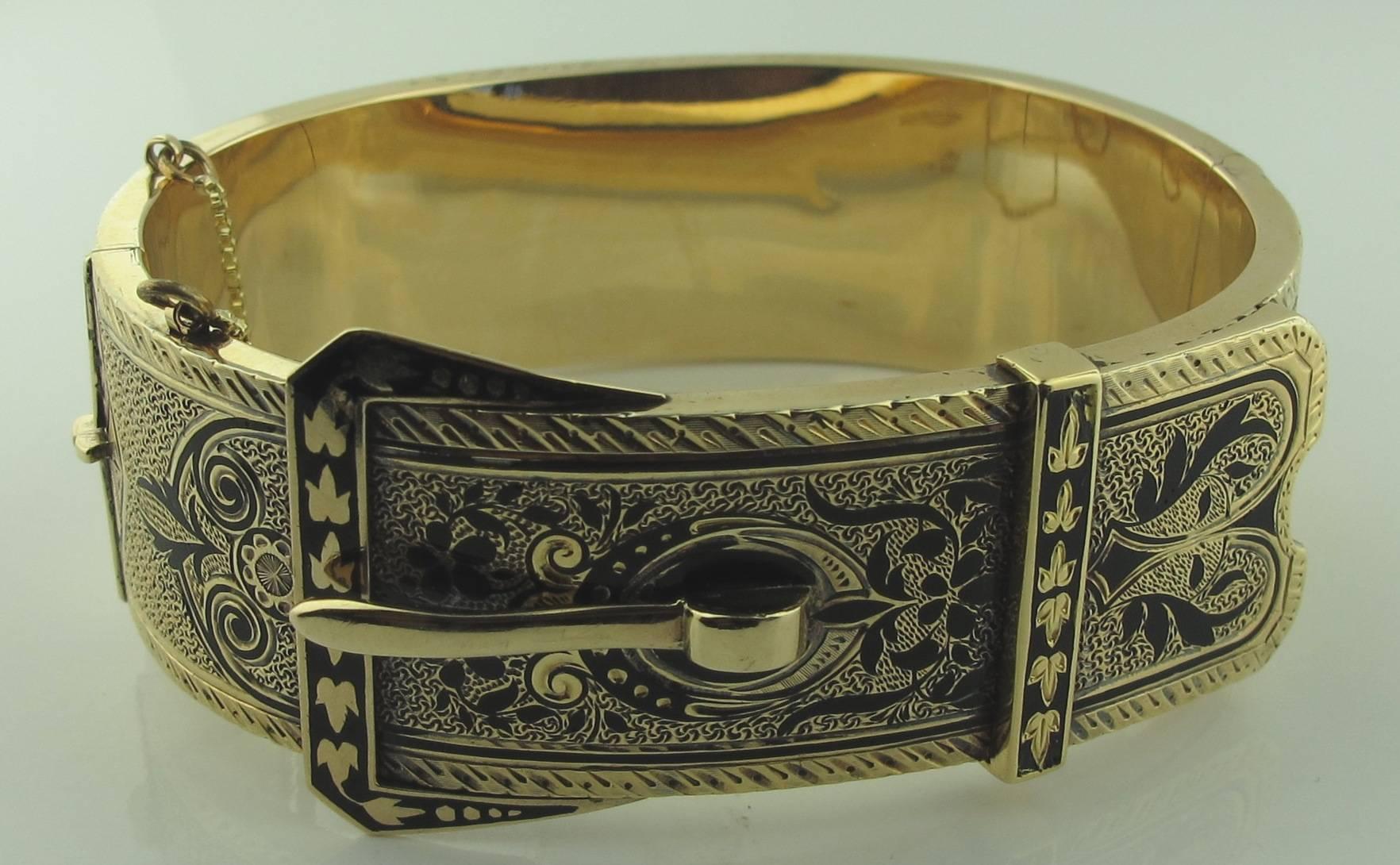 Cuff Bracelet in belt buckle design set in 14 carat yellow gold, weighing 41 grams.