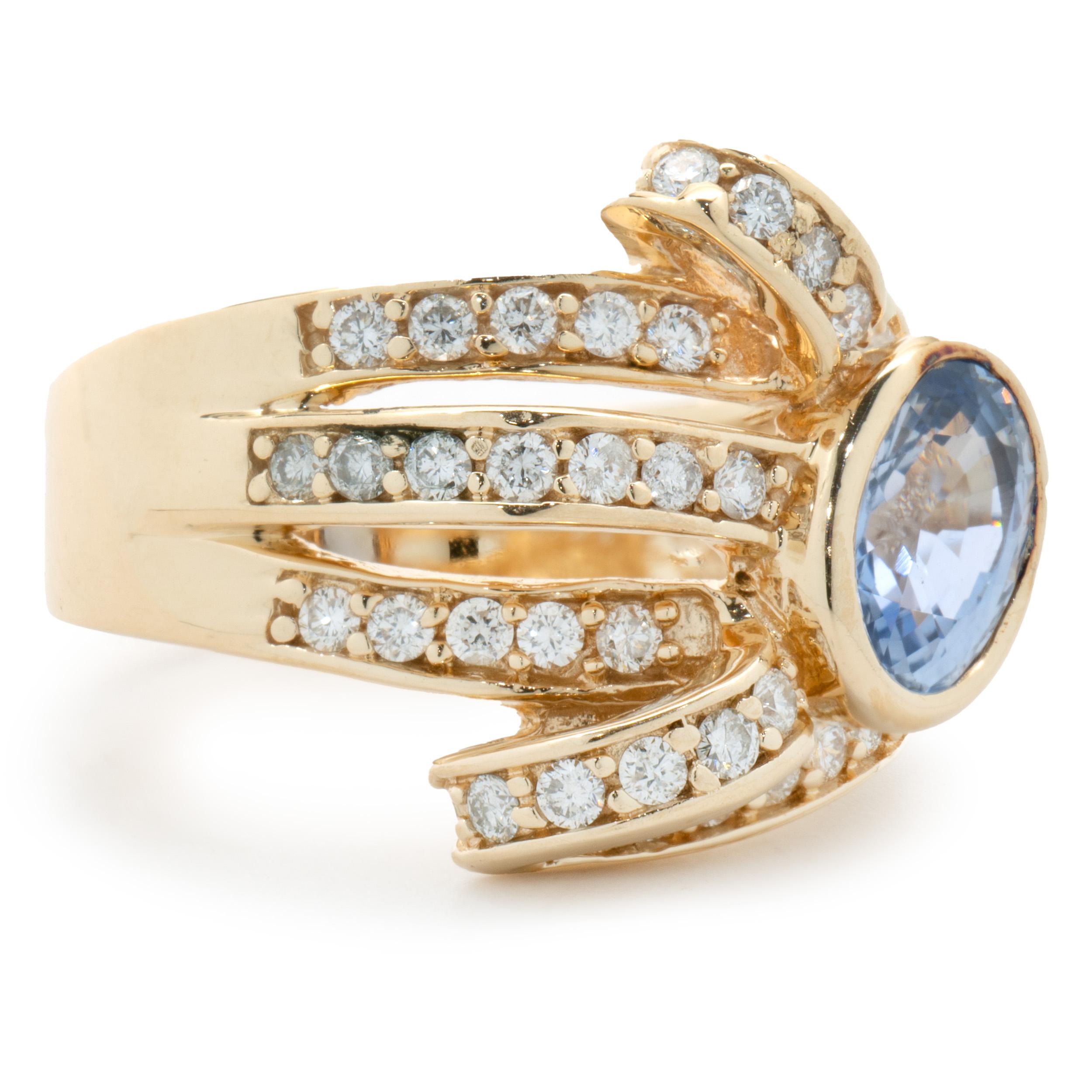Designer: custom design
Material: 14K yellow gold
Diamond: 44 round brilliant cut = 0.66cttw
Color: H 
Clarity: SI1
Sapphire: 1 oval cut = 2.07ct
Dimensions: ring top measures 16.5mm wide
Ring Size: 7 (please allow two extra shipping days for sizing