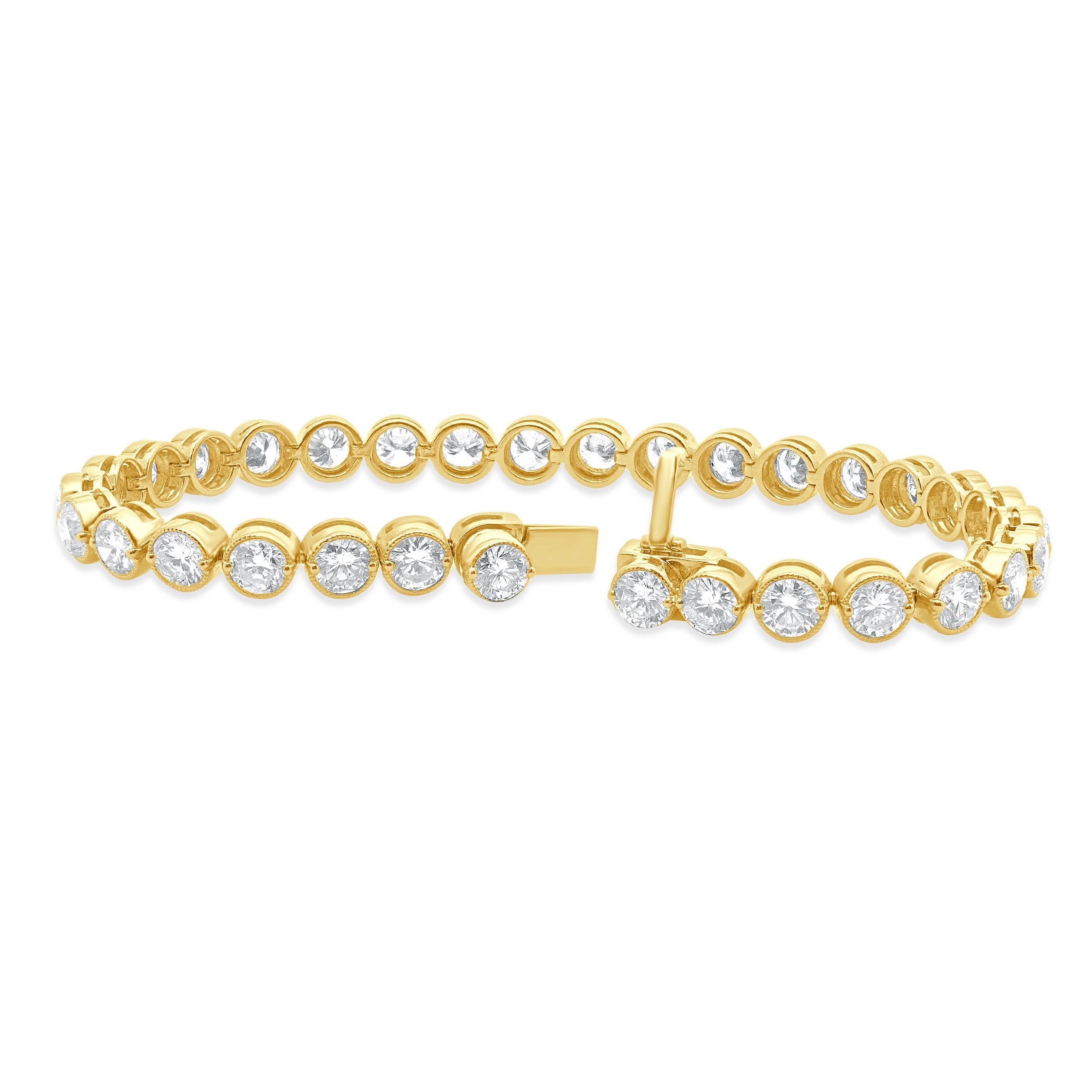 Designer: custom design
Material: 18K yellow gold
Diamond: 32 round brilliant cut = 11.15cttw
Color: G / H
Clarity: SI1
Dimensions: bracelet will fit up to a 7.25-inch wrist
Weight: 19.26 grams