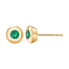 14 Karat Yellow Gold Bezel Set Emerald Stud Earrings Weighing 0.30 Carat