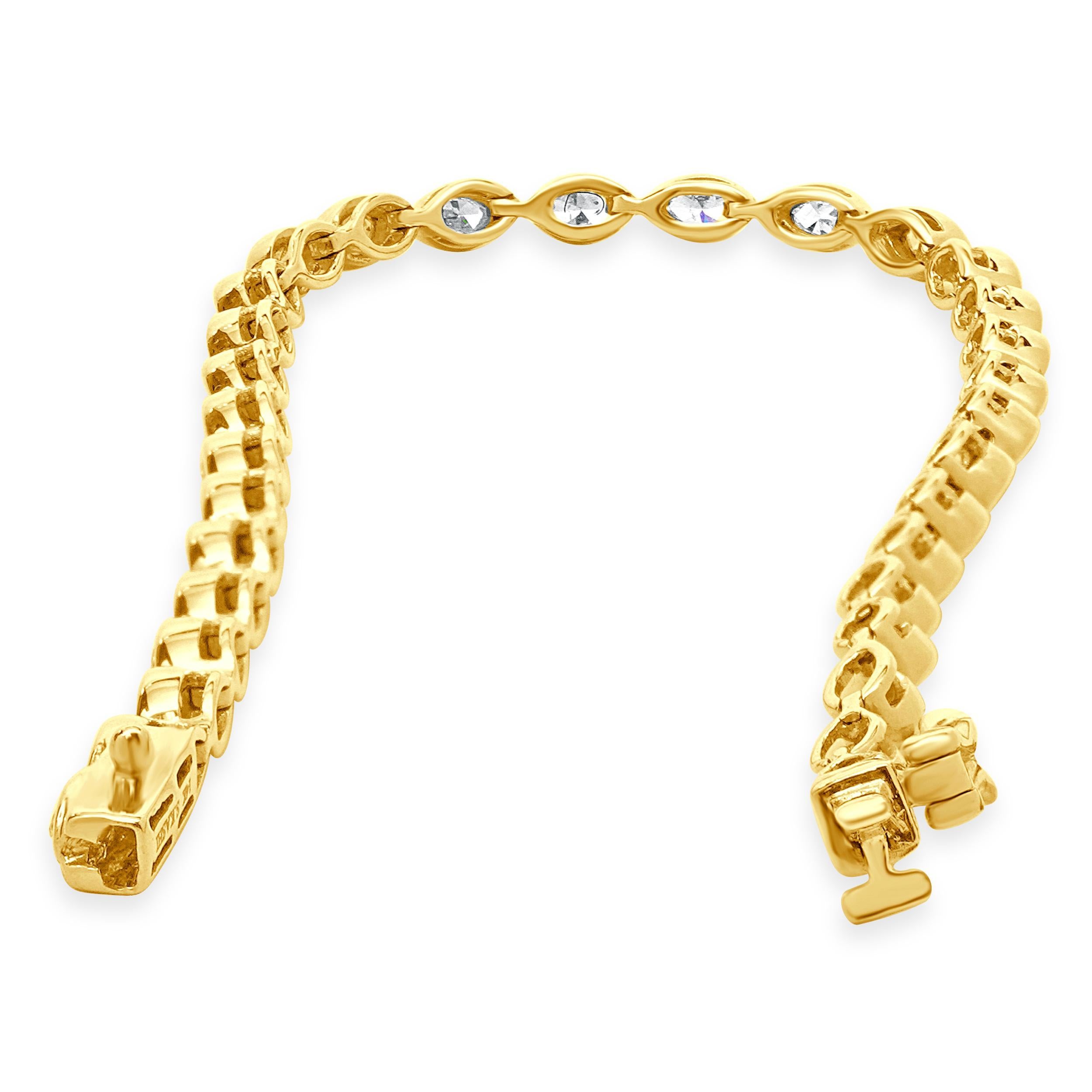 Women's 14 Karat Yellow Gold Bezel Set Marquise Cut Diamond Inline Tennis Bracelet For Sale