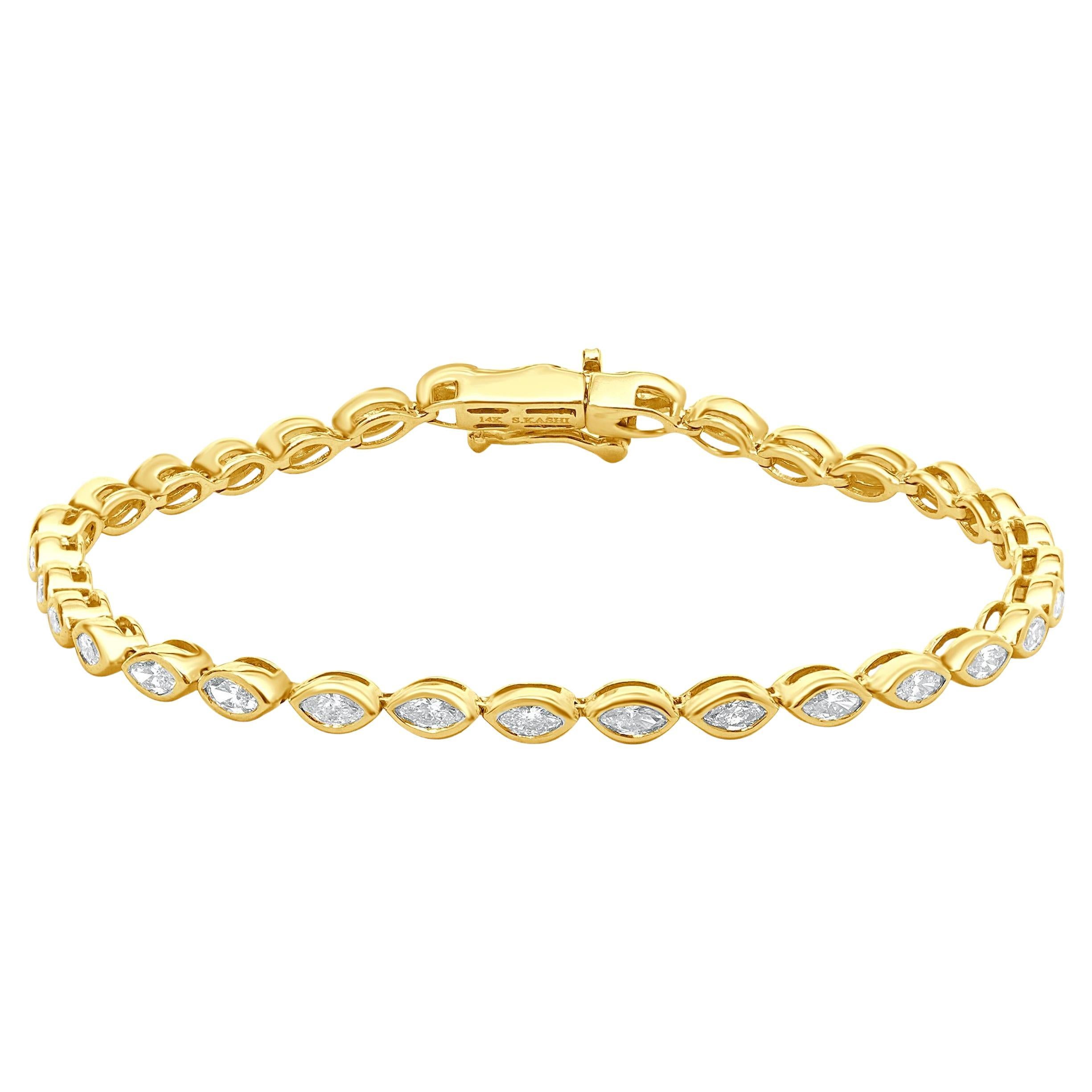 14 Karat Yellow Gold Bezel Set Marquise Cut Diamond Inline Tennis Bracelet