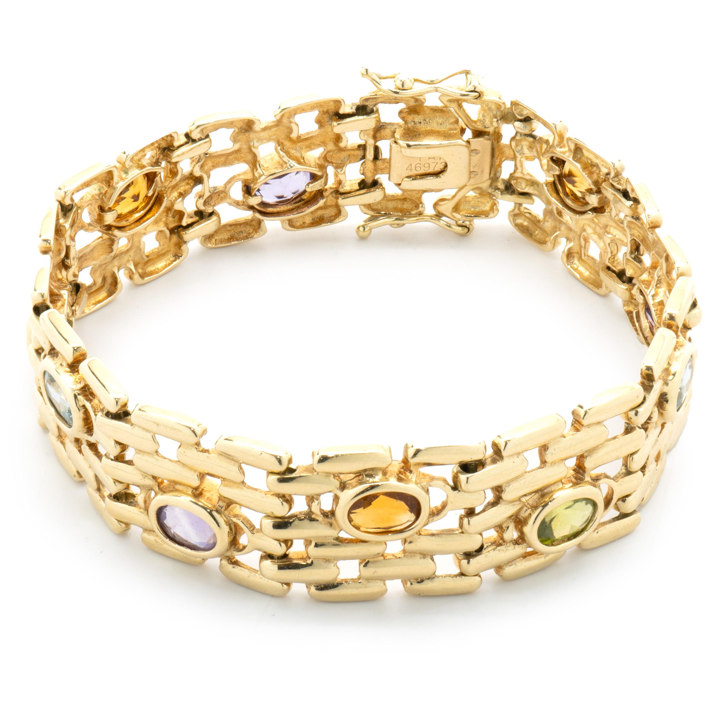 Designer: custom
Material: 14K yellow gold
Weight:  33.31 grams
Dimensions: bracelet will fit up to a 7-inch wrist