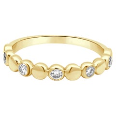 14 Karat Yellow Gold Bezel Set Round Diamond Station Band