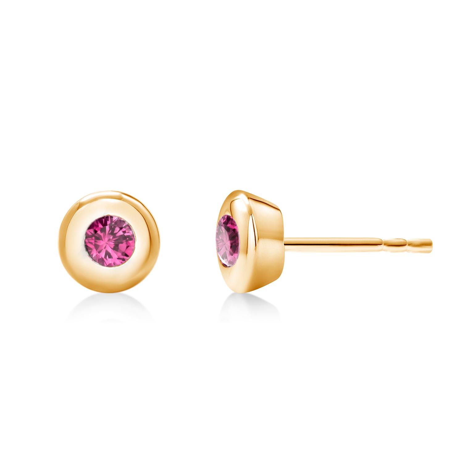 14 karat yellow gold round ruby stud earrings
Two round ruby measuring 3 millimeters each 
Ruby hue tone color is fuchsia red
Rubies weighing 0.30   
New Earrings
New Earrings
Handmade in the USA
The 14 karat gold earrings are attached to a straight