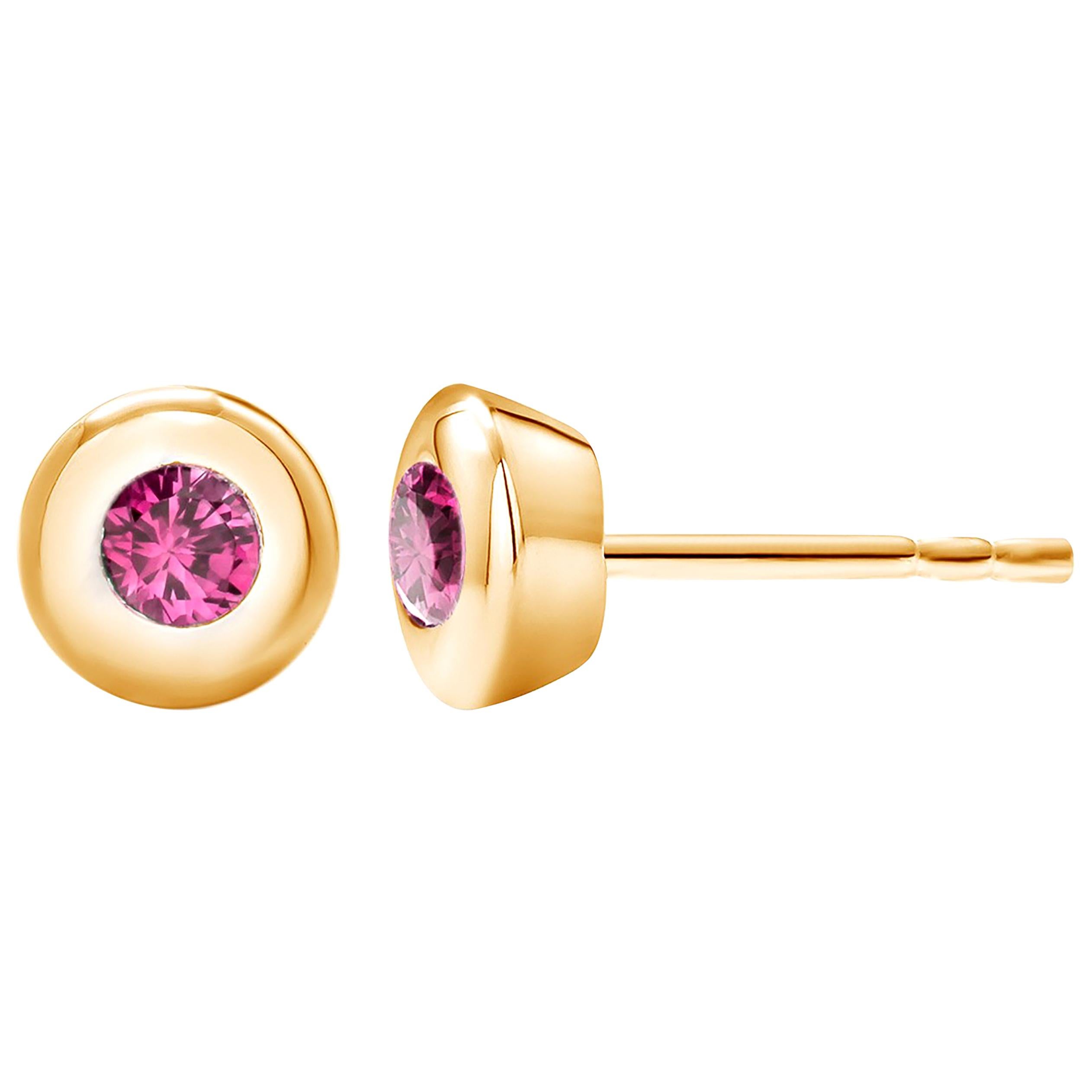 14 Karat Yellow Gold Bezel Set Ruby Stud Earrings Weighing 0.30 Carat