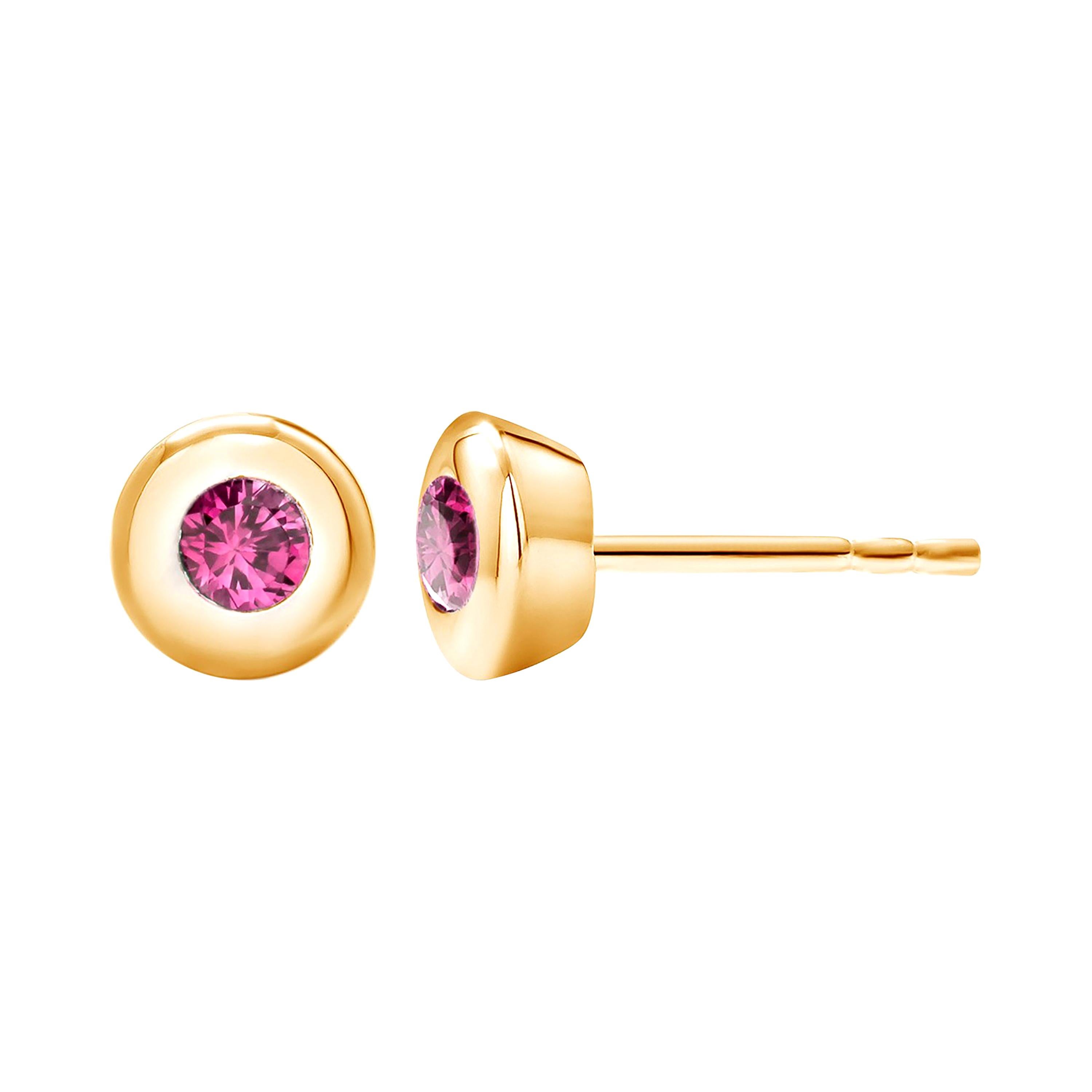 14 Karat Yellow Gold Bezel Set Ruby Stud Earrings Weighing 0.30 Carat