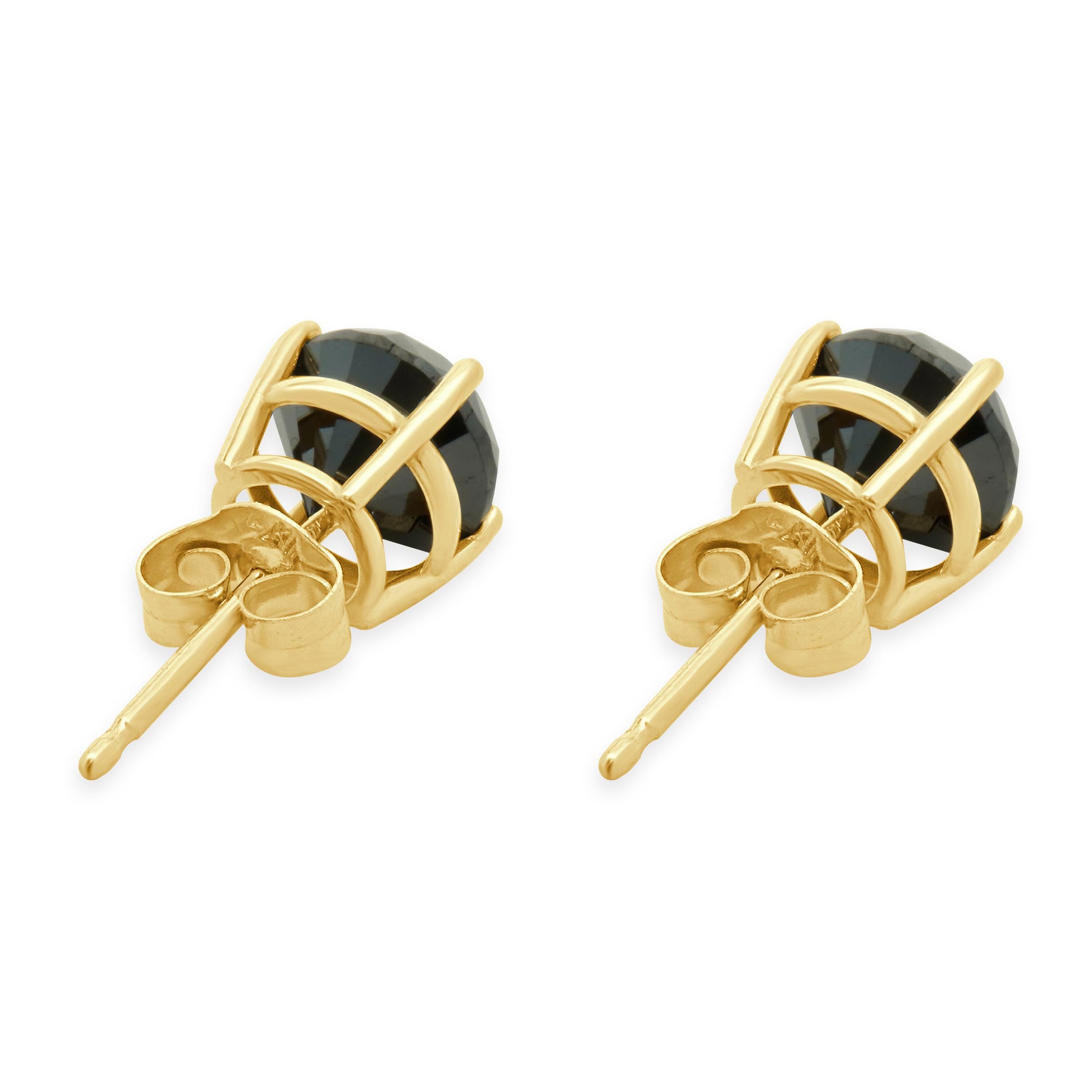 Material: 14K yellow gold
Diamonds: 2 round brilliant cut = 1.55cttw
Color: Black
Clarity: SI2
Dimensions: earrings measure approximately 6.20mm in diameter
Fastenings: friction backs
Weight: 1.24 grams
