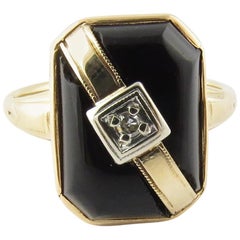 14 Karat Yellow Gold Black Onyx and Diamond Ring