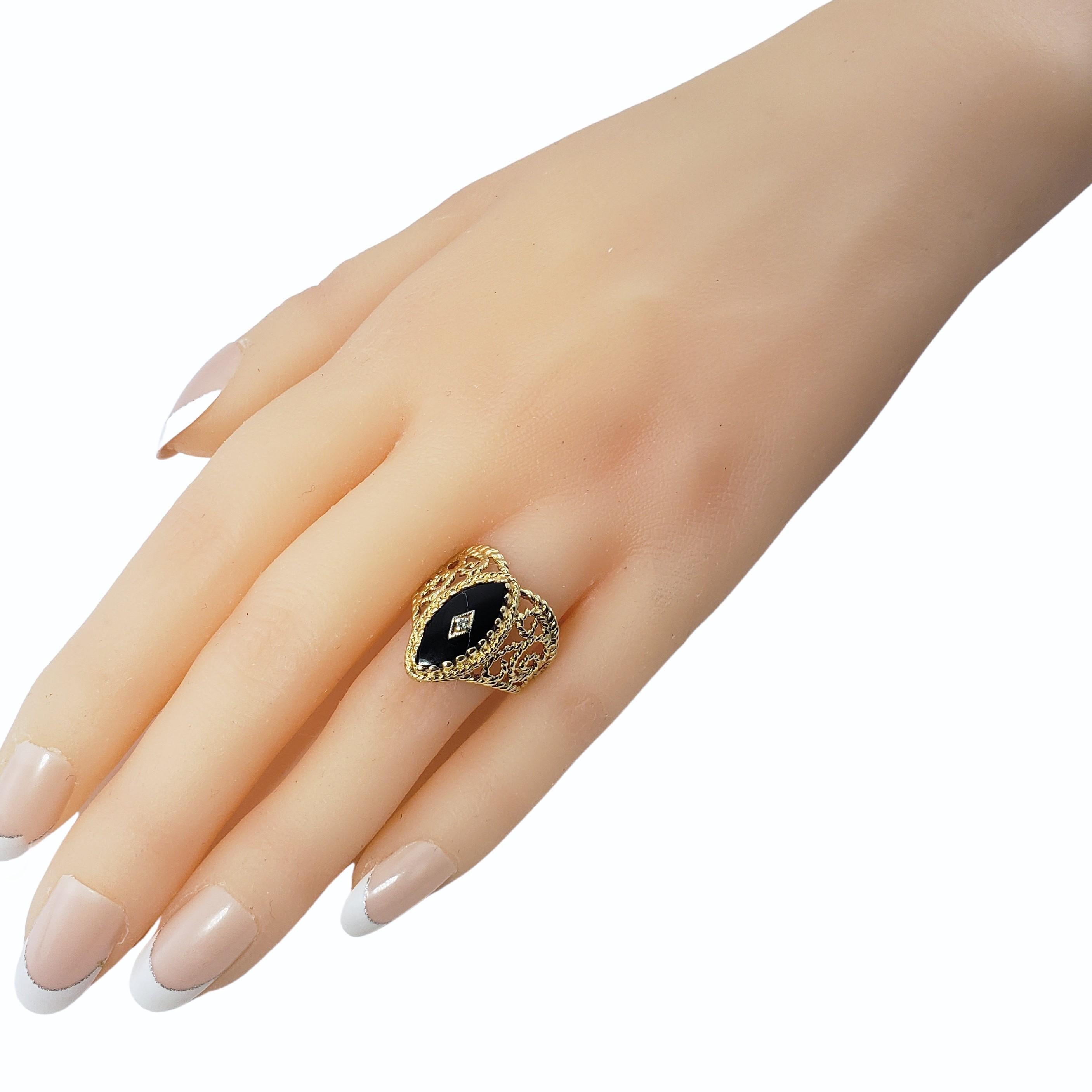 14 Karat Yellow Gold Black Onyx and Diamond Ring 2