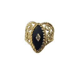 14 Karat Yellow Gold Black Onyx and Diamond Ring