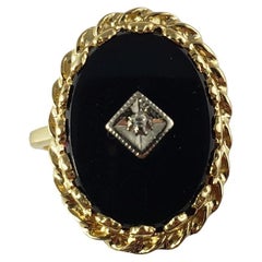 Vintage 14 Karat Yellow Gold Black Onyx and Diamond Ring