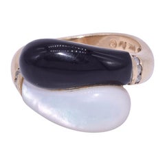 14 Karat Yellow Gold, Black Onyx, Mother of Pearl and Diamond Bypass Ring