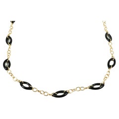 Collier en or jaune 14 carats et onyx noir