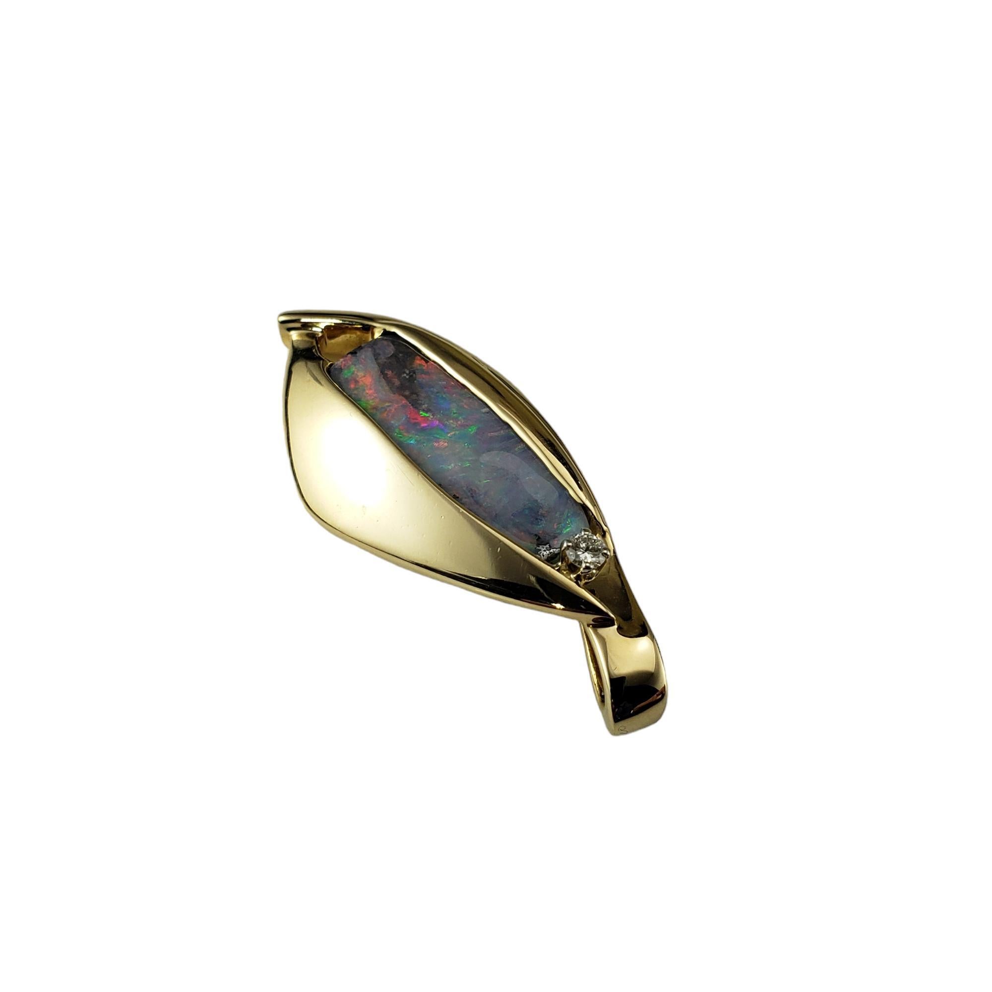 14 Karat Black Opal and Diamond Pendant-

This lovely pendant features a stunning black opal stone accented with one round brilliant cut diamond and set in 14K yellow gold.

Approximate total diamond weight: .04 ct.

Diamond color: G

Diamond