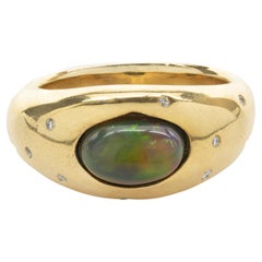 14 Karat Yellow Gold Black Opal and Diamond Ring