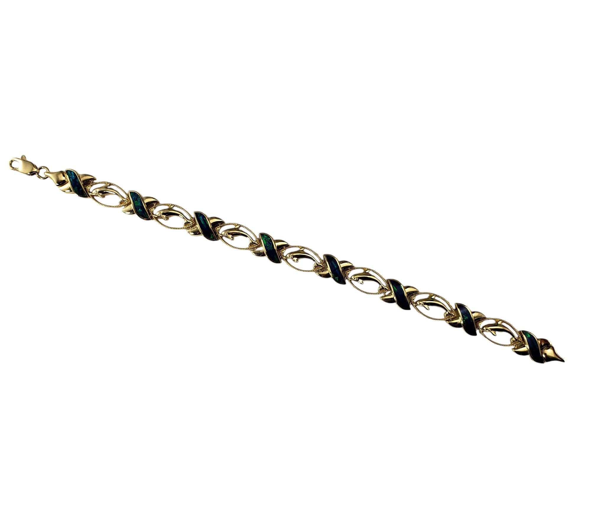 Contemporary 14 Karat Yellow Gold & Black Opal XO Dolphin Bracelet  #18582 For Sale