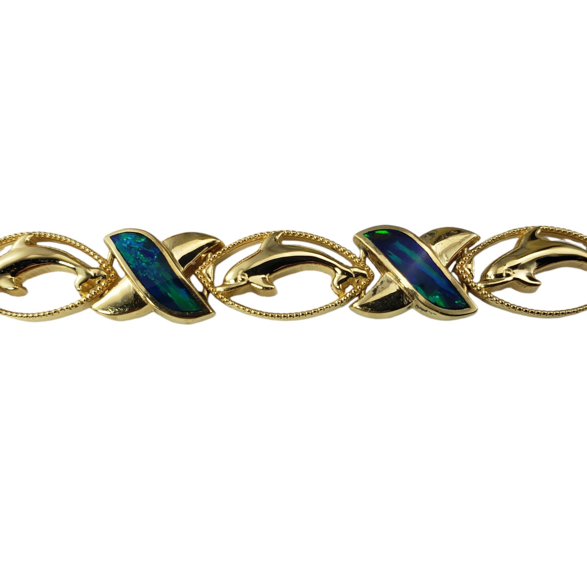 Baguette Cut 14 Karat Yellow Gold & Black Opal XO Dolphin Bracelet  #18582 For Sale