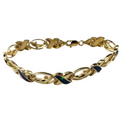 Vintage 14 Karat Yellow Gold & Black Opal XO Dolphin Bracelet  #18582