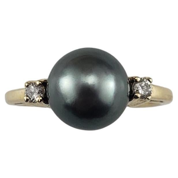 Anillo de oro amarillo de 14 quilates con perla negra y diamantes talla 6.25 #19228
