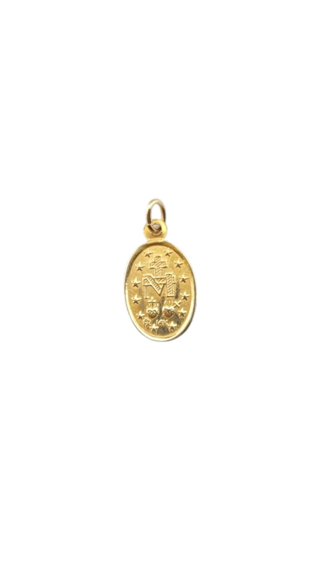 Colgante de oro amarillo de 14 quilates con la Medalla Milagrosa de la Virgen María

¡Abraza la protección divina con este Colgante de Oro Amarillo de 14 quilates de la Virgen María! Símbolo de gracia, amor y guía, esta pieza bellamente elaborada es