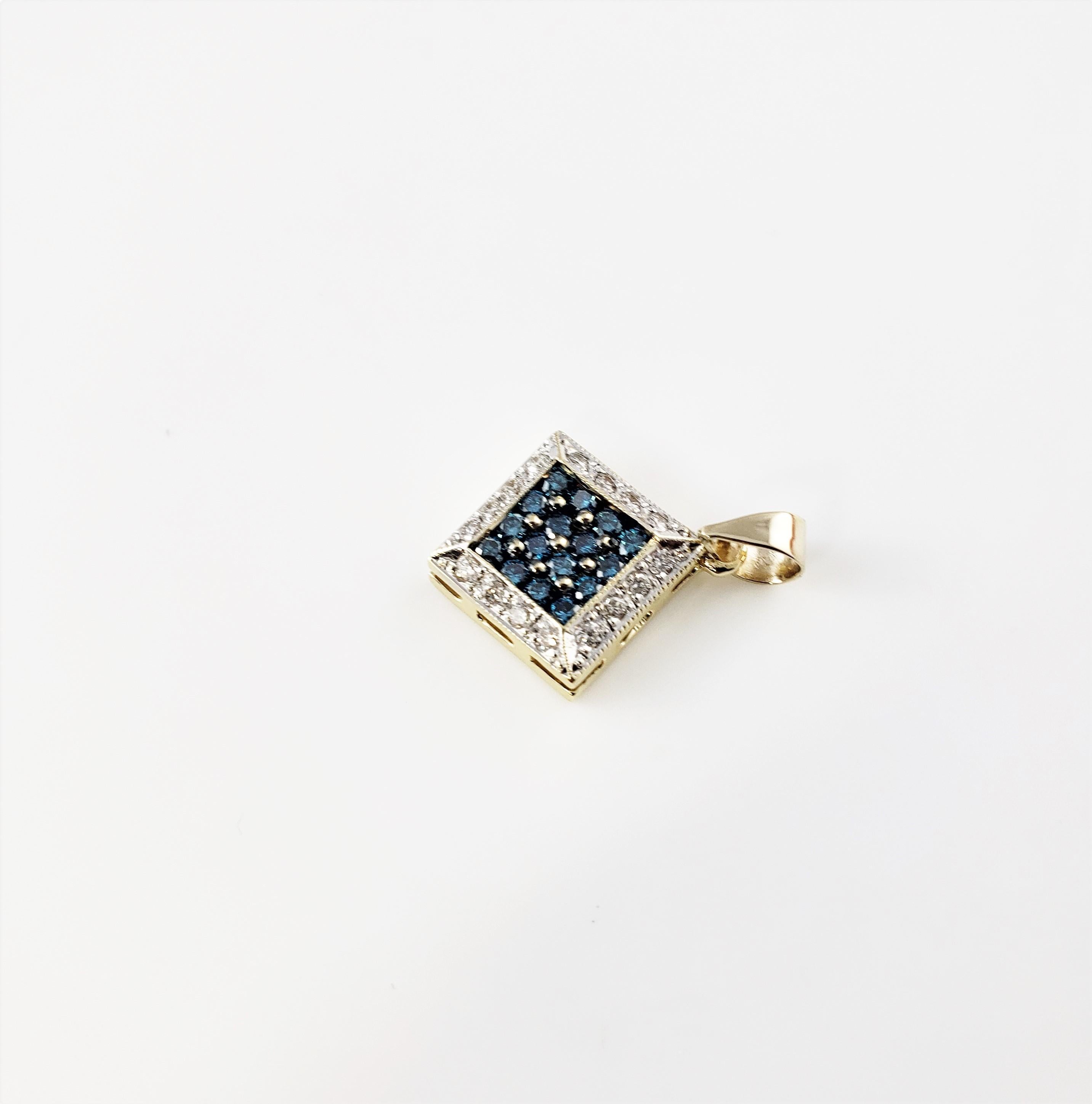 Vintage 14 Karat Yellow Gold Color-Treated Blue Diamond and White Diamond Pendant-

This lovely pendant features 16 round brilliant cut color-treated blue diamonds and 16 round brilliant cut white diamonds set in beautifully detailed 14K yellow