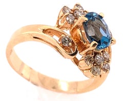 14 Karat Yellow Gold Blue Emerald Ring with Diamond Accents 50.00 TDW