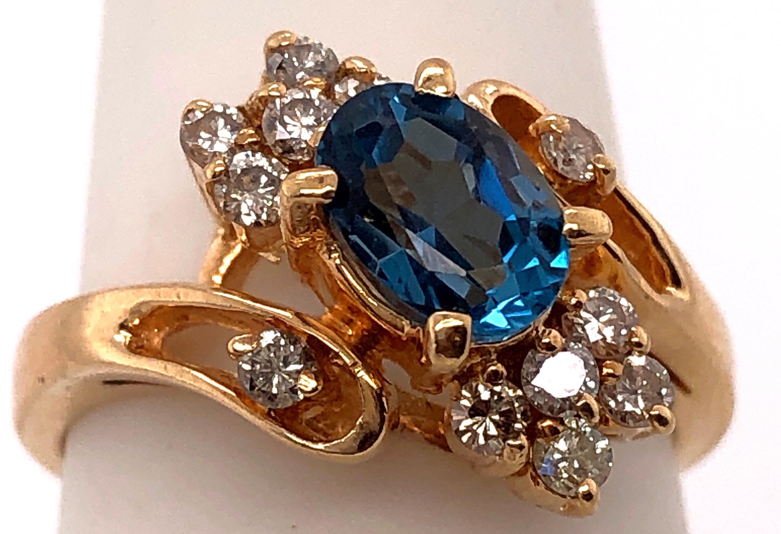 Modern 14 Karat Yellow Gold Blue Emerald Ring with Diamond Accents 50.00 TDW For Sale