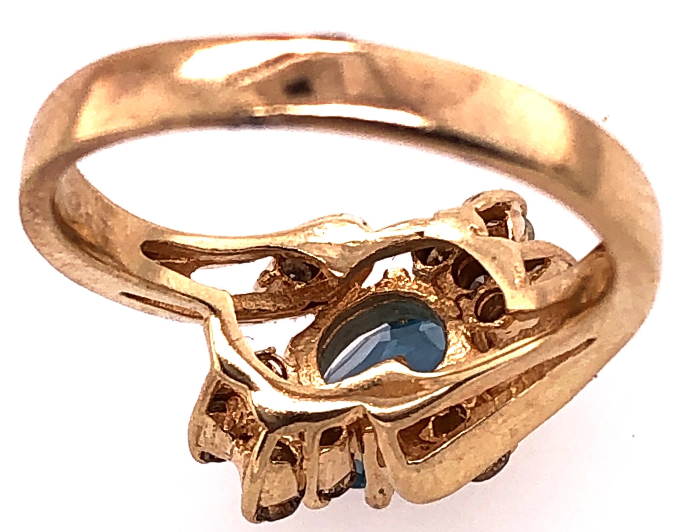 Round Cut 14 Karat Yellow Gold Blue Emerald Ring with Diamond Accents 50.00 TDW For Sale