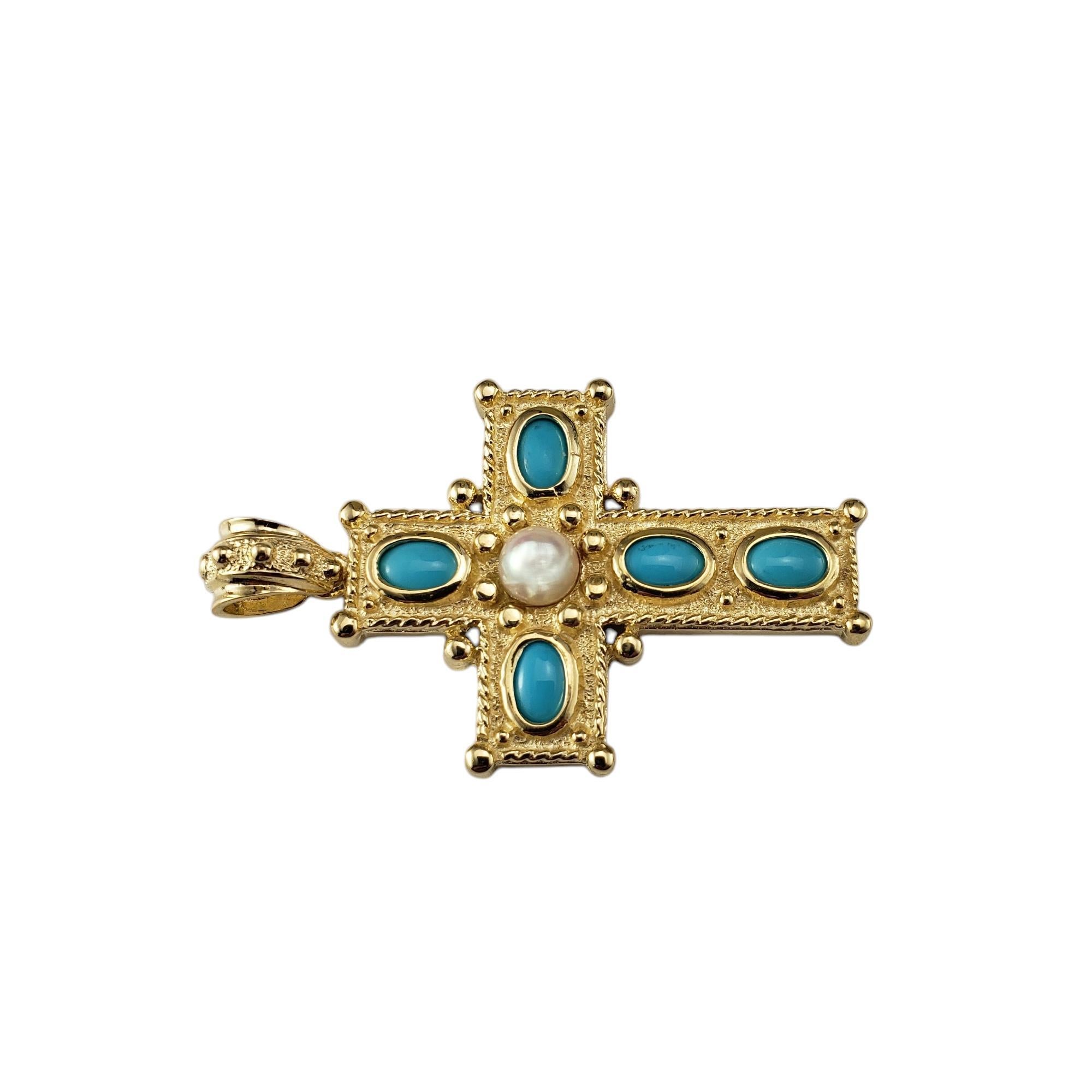 14 Karat Yellow Gold Blue Stone and Pearl Cross Pendant-

This stunning 14K yellow gold cross pendant features a beautiful combination of vibrant blue cabochon stones and a luminous pearl at its center. This sophisticated piece blends classic and
