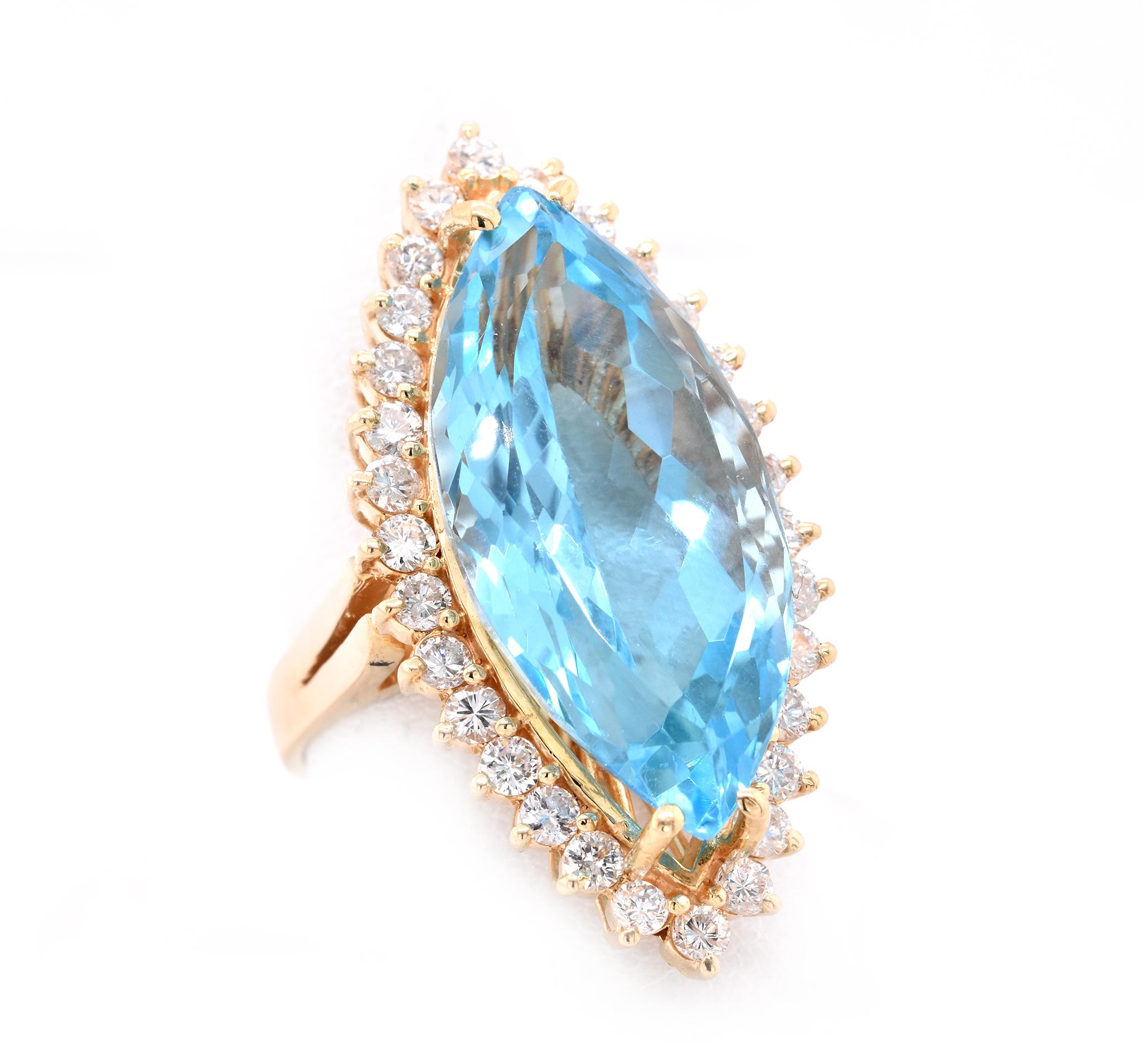 Designer: custom
Material: 14K yellow gold
Blue Topza: 1 marquise cut = 19.43ct
Diamond: 30 round cut = 1.50cttw
Color: G
Clarity: VS
Ring Size: 7.25 (please allow up to 2 additional business days for sizing requests)
Dimensions: ring shank measures