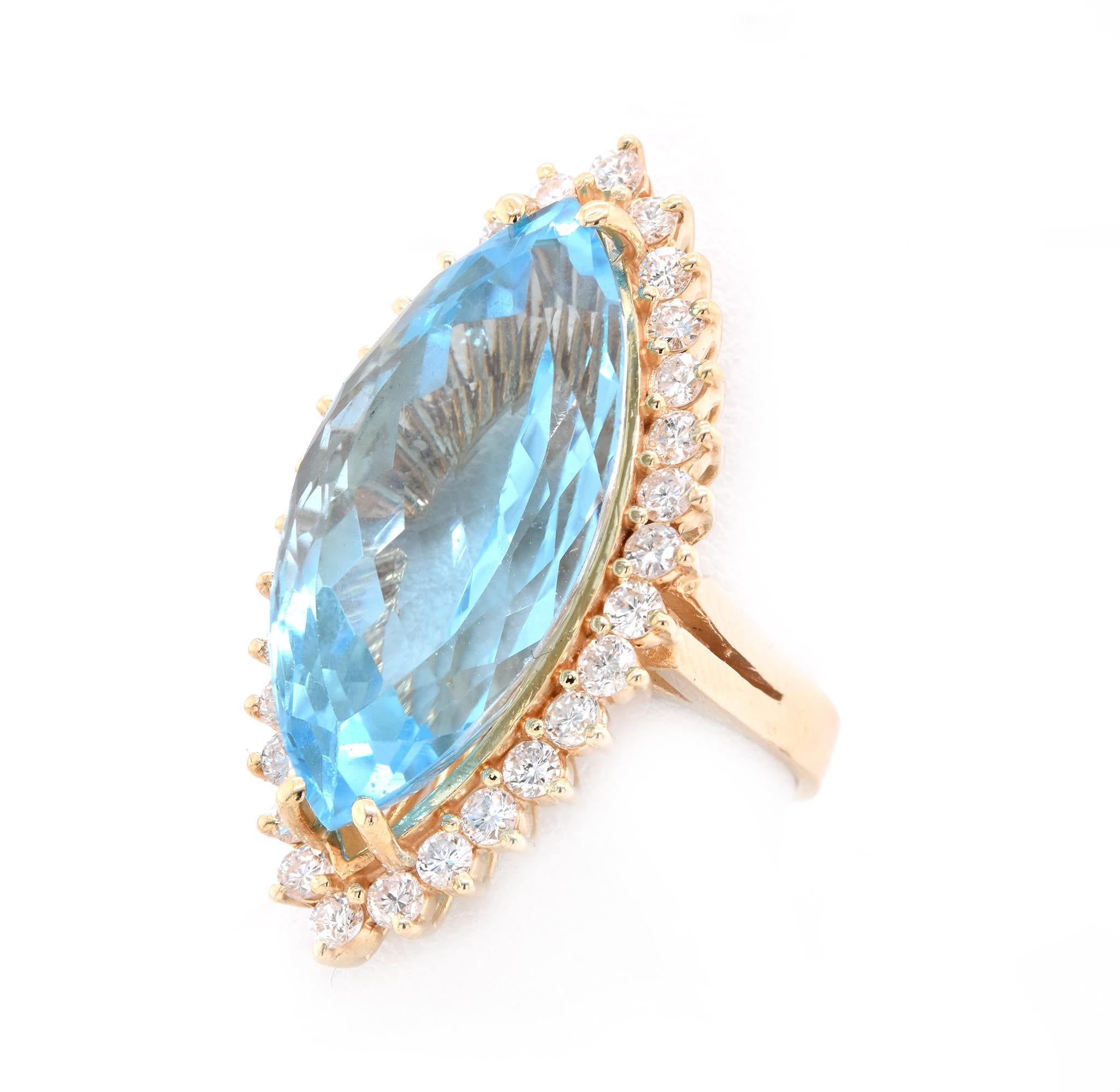 Marquise Cut 14 Karat Yellow Gold Blue Topaz and Diamond Cocktail Ring