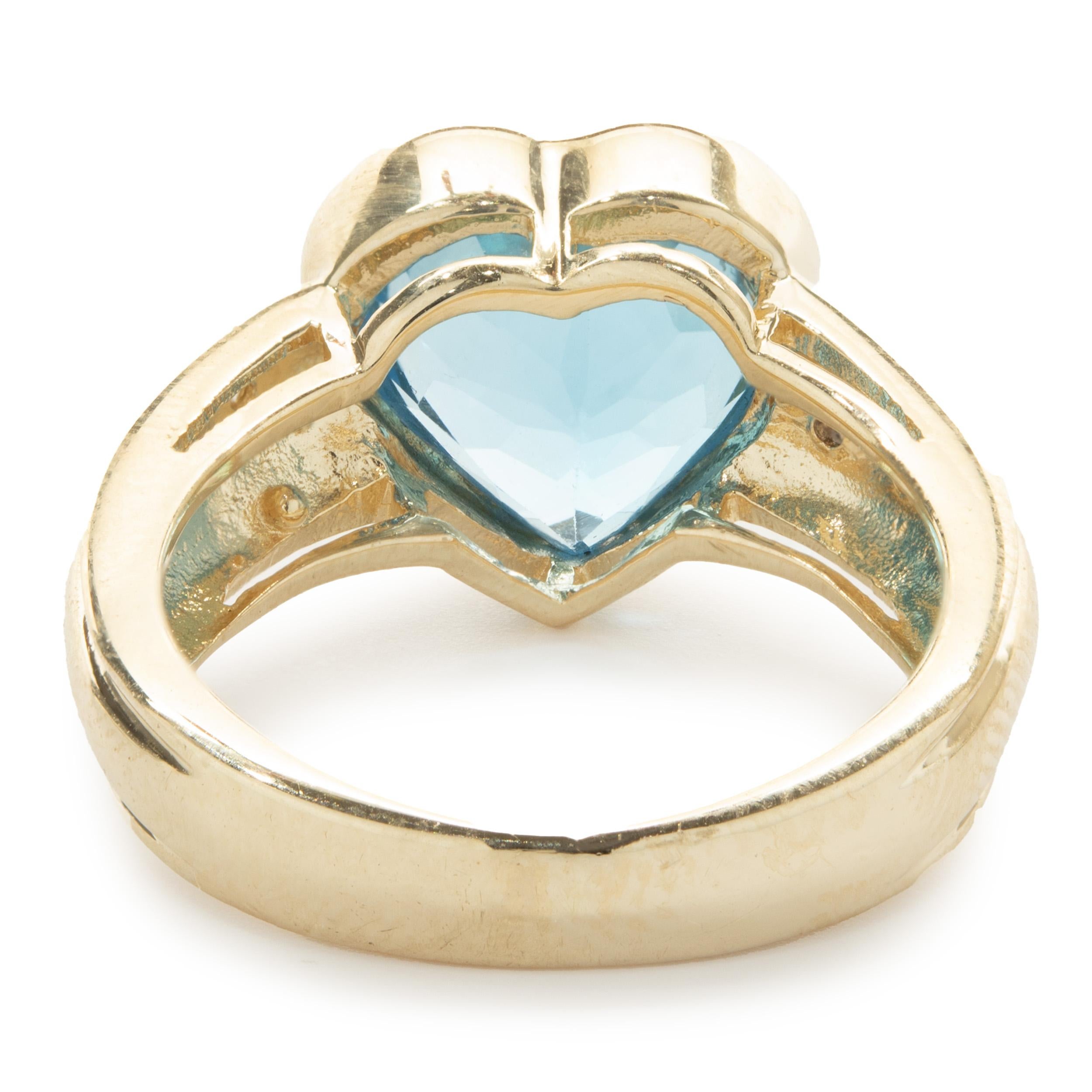 blue topaz heart ring yellow gold