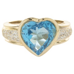 14 Karat Yellow Gold Blue Topaz and Diamond Heart Ring