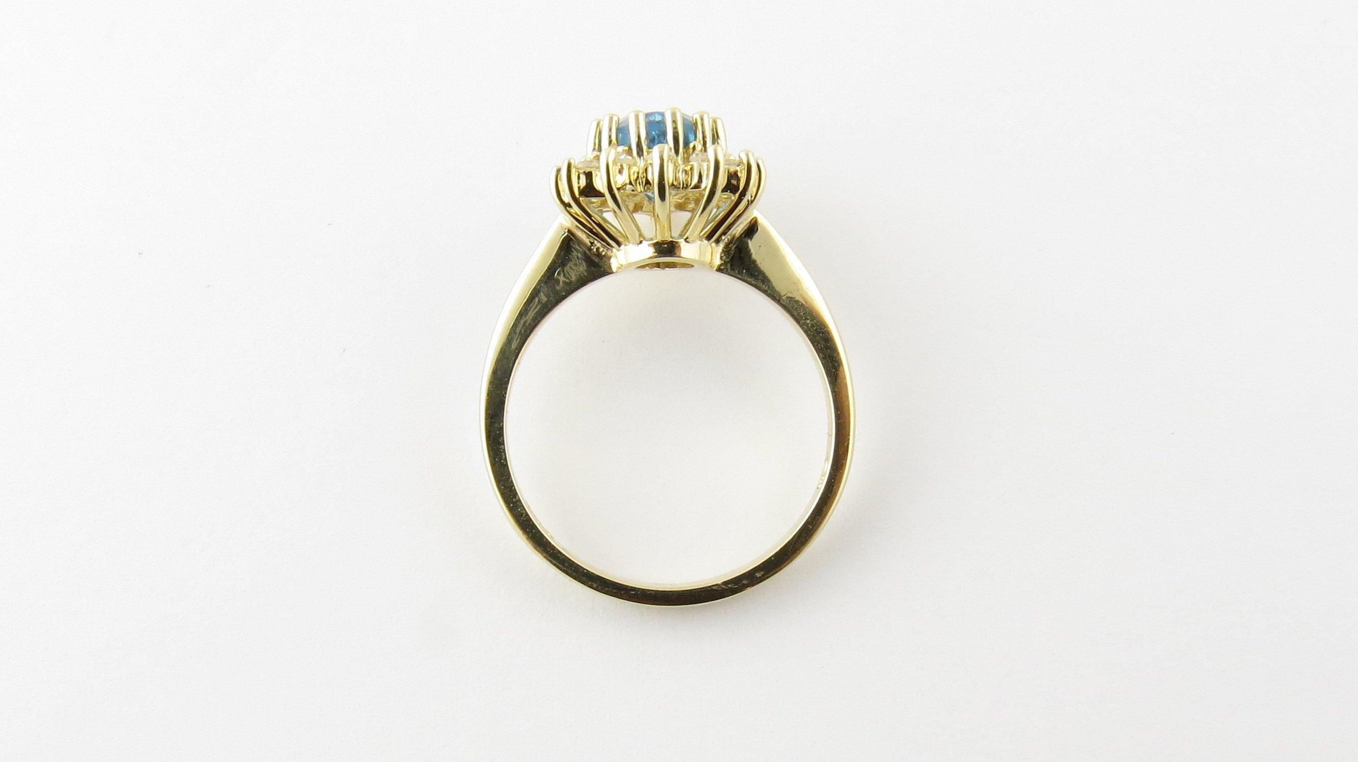 Women's 14 Karat Yellow Gold Blue Topaz and Diamond Ring