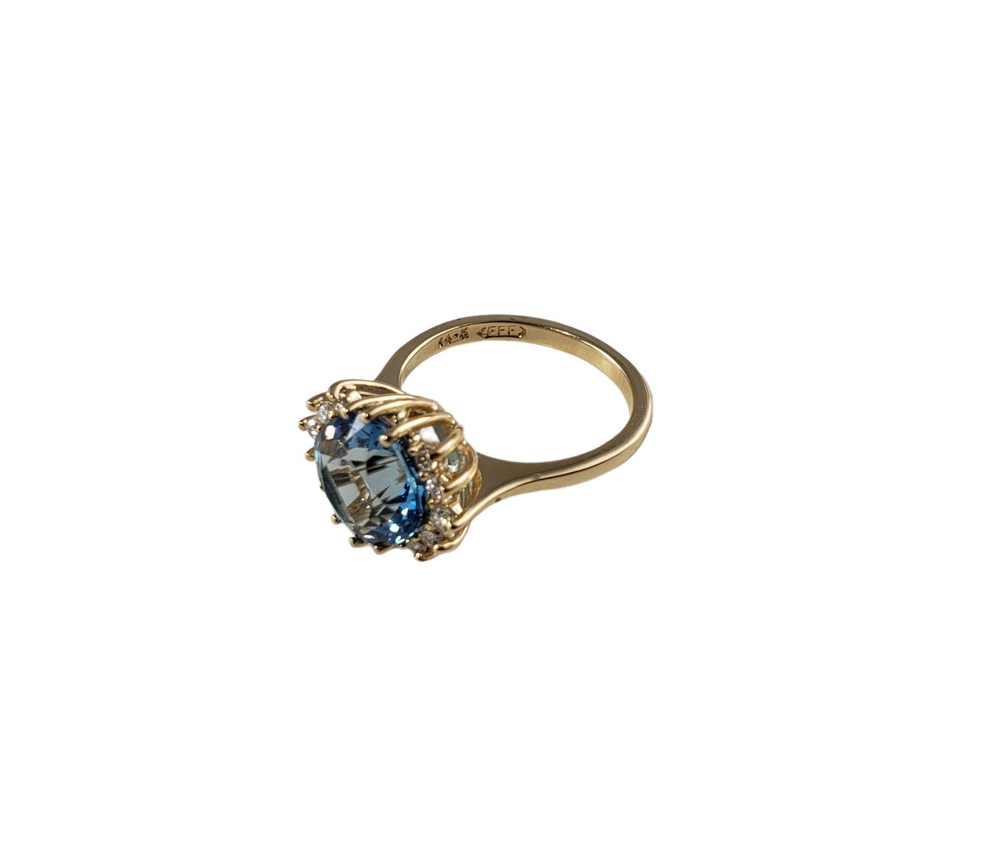 Vintage 14 Karat Yellow Gold Blue Topaz and Diamond Ring Size 6.25 JAGi Certified-

This stunning ring features one square cushion cut blue topaz surrounded by ten round brilliant cut diamond set in classic 14k yellow gold. Width: 1 1 mm. Shank: 2