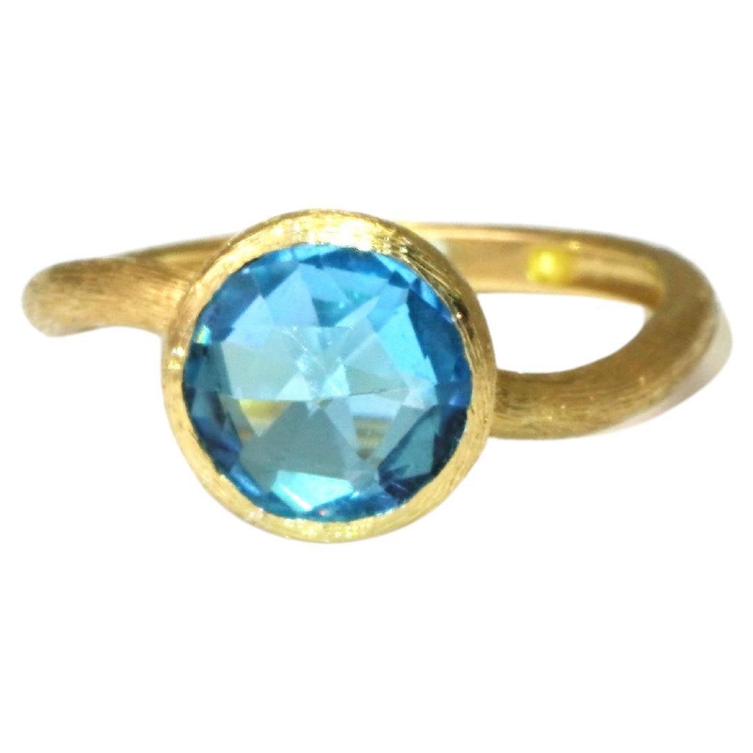 Bague en or jaune 14 carats avec topaze bleue en vente