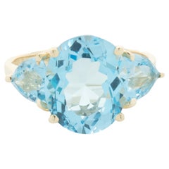 14 Karat Yellow Gold Blue Topaz Three Stone Ring 14 Karat Yellow Gold Blue Topaz Three Stone Ring