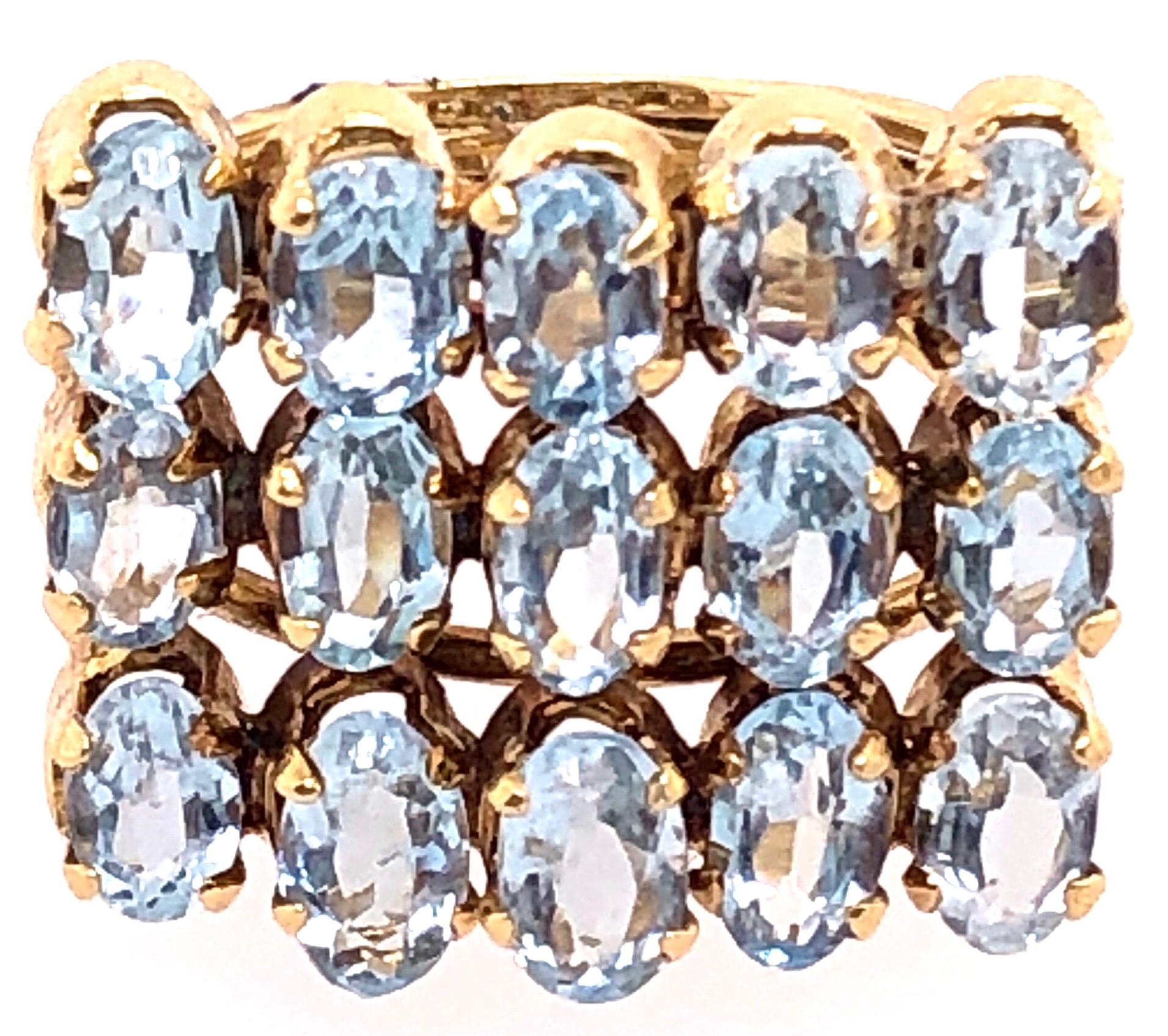 14 Karat Yellow Gold Fashion Blue Topaz Ring.
Size 5.5
6.42 grams total weight.