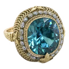 14 Karat Yellow Gold Blue Zircon and Seed Pearl Dress Ring