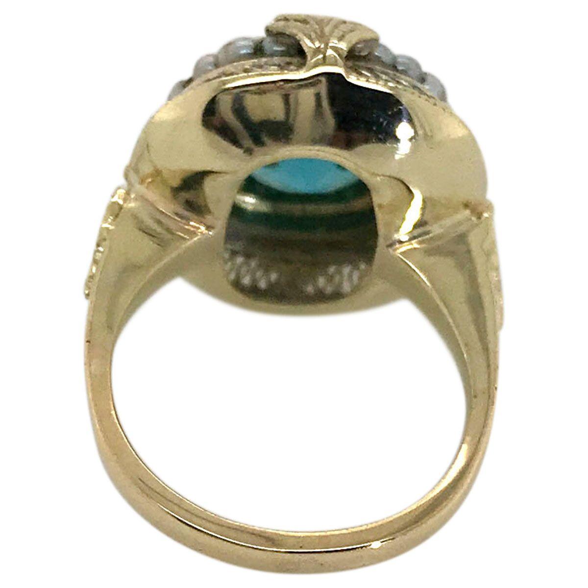 Oval Cut 14 Karat Yellow Gold Blue Zircon and Seed Pearl Dress Ring