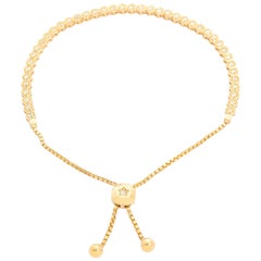 14 Karat Yellow Gold Bolo Tennis Bracelet