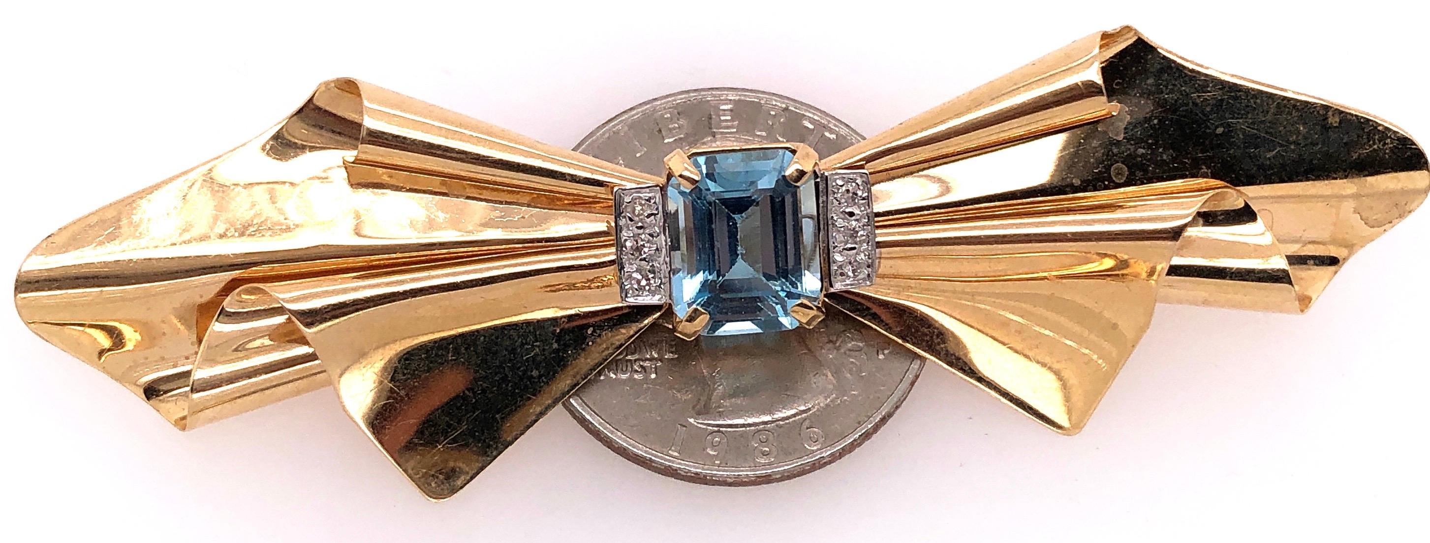 14 Karat Yellow Gold Bow Brooch with Blue Topaz and Diamond Accents For Sale 4