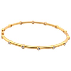 14 Karat Yellow Gold Brushed Bezel Set Diamond Bangle Bracelet