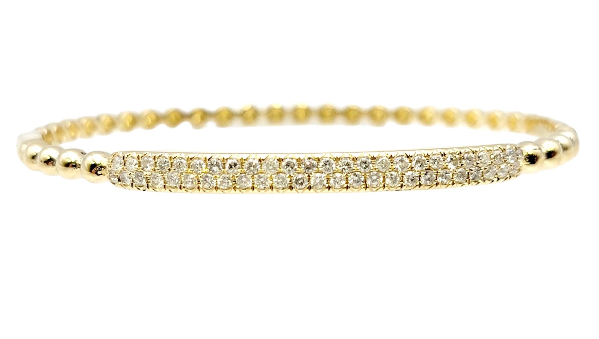 Round Cut 14 Karat Yellow Gold Bubble Style Narrow Stacking Bangle Bracelet with Diamonds For Sale