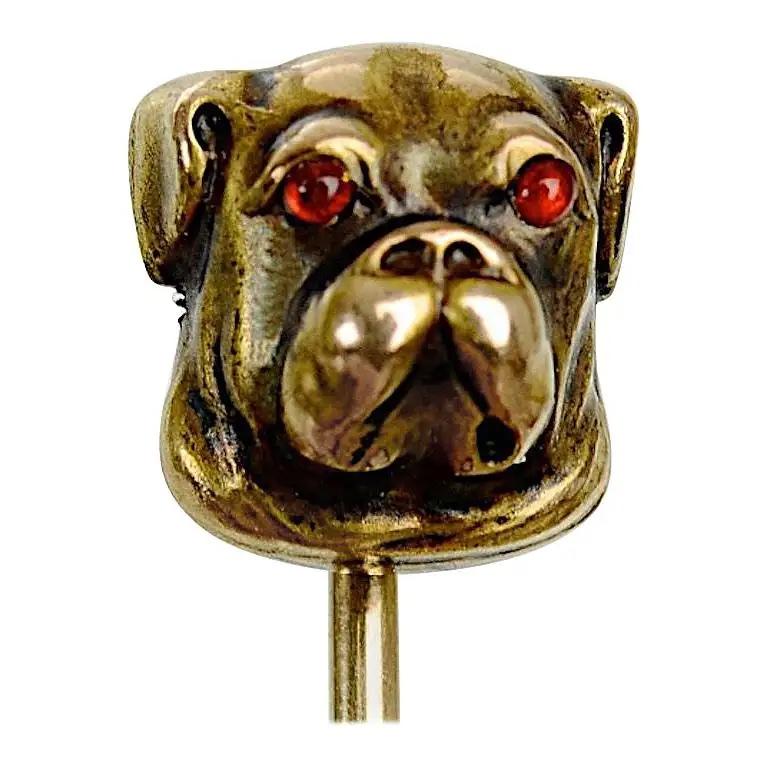 14K Yellow Gold Bull Dog Stick Pin with Cabochon Ruby Eyes. Unmarked, tested 14K gold. With a beautiful patina.
N.P. Trent has been a respected name in antiques for over 30 years with a large collection of antique and vintage jewelry.