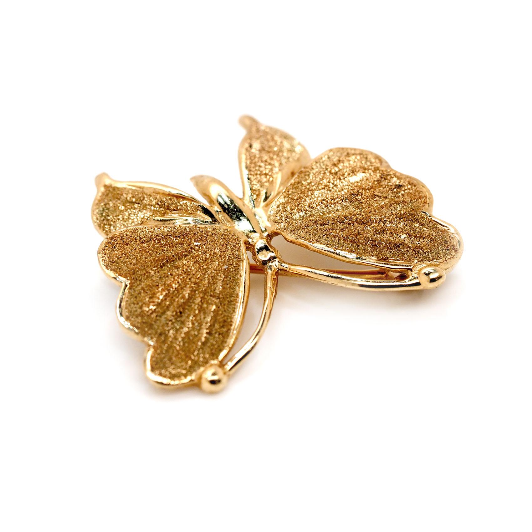 Please see this 14k Yellow Gold Butterfly Pin. I have shot images from various angles so you can see it completely (both front and back). This piece weighs 5.0 grams total. 